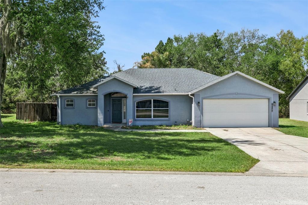 Photo of 10644 Cedar Forest Circle, Clermont, FL 34711 (MLS # O6391347)