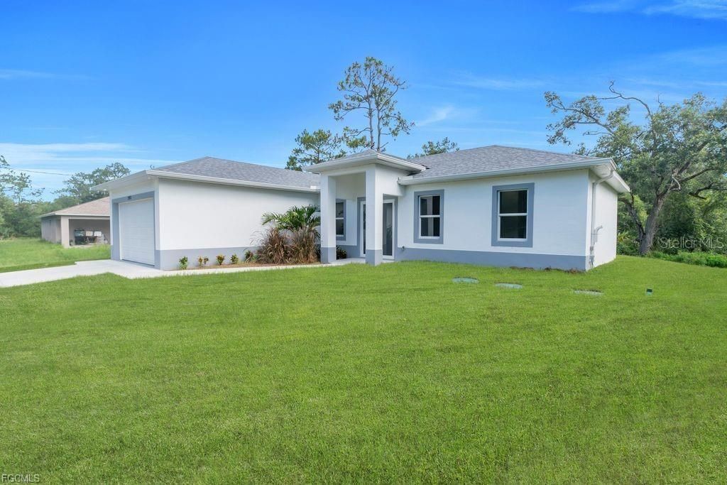 Photo of 2003 E 14th Street, Lehigh Acres, FL 33972 (MLS # A4659995)