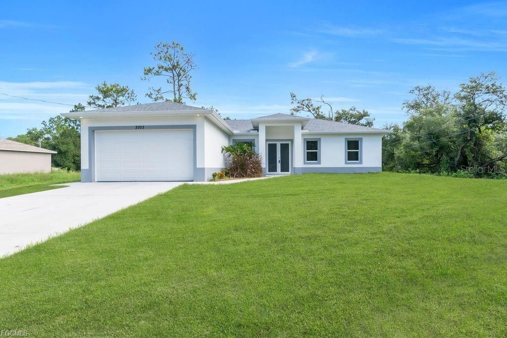 Photo of 2003 E 14th Street, Lehigh Acres, FL 33972 (MLS # A4659995)