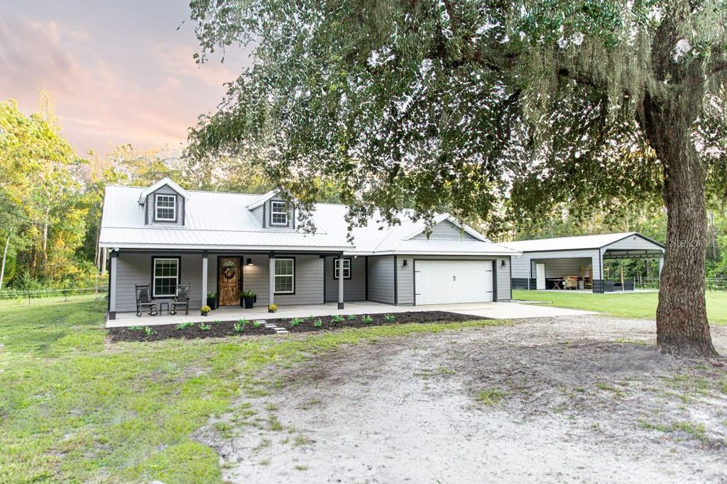 Photo of 1533 County Road 13, Bunnell, FL 32110 (MLS # A4667609)