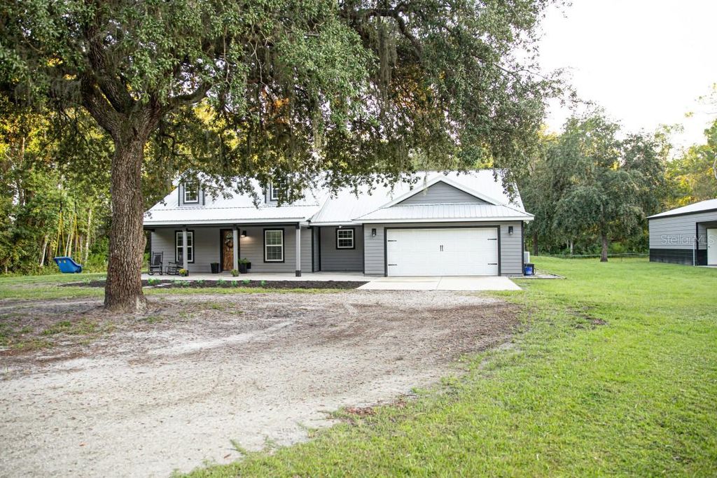 Photo of 1533 County Road 13, Bunnell, FL 32110 (MLS # A4667609)