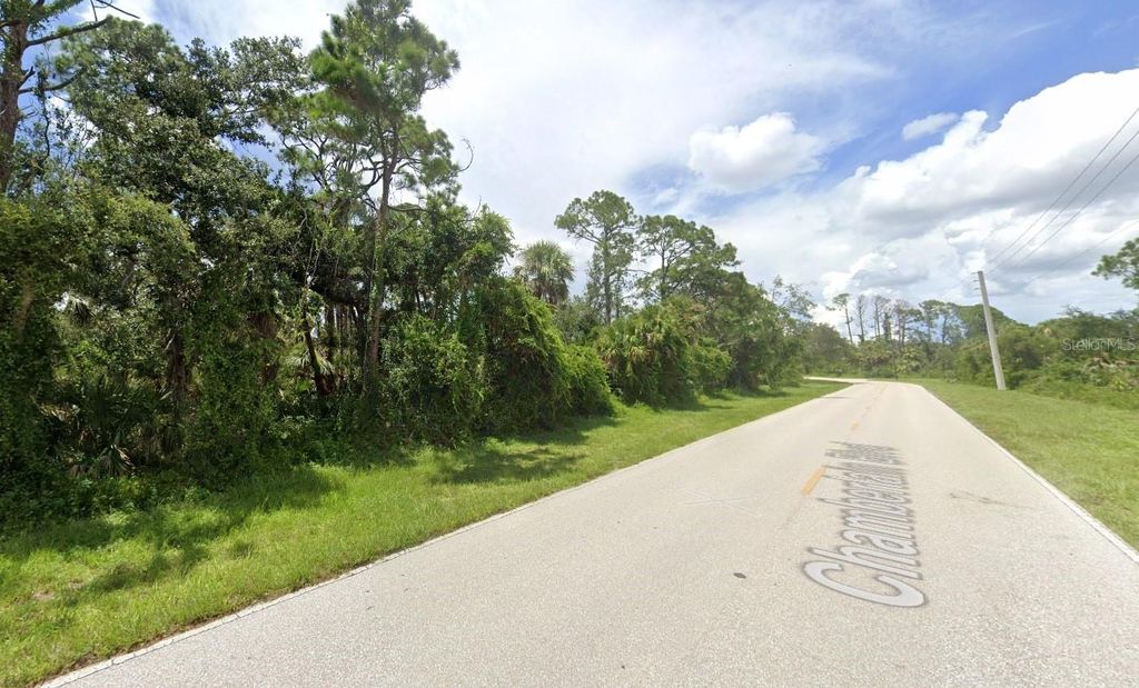 Photo of 16226 Chamberlain Boulevard, Port Charlotte, FL 33954 (MLS # TB8356876)