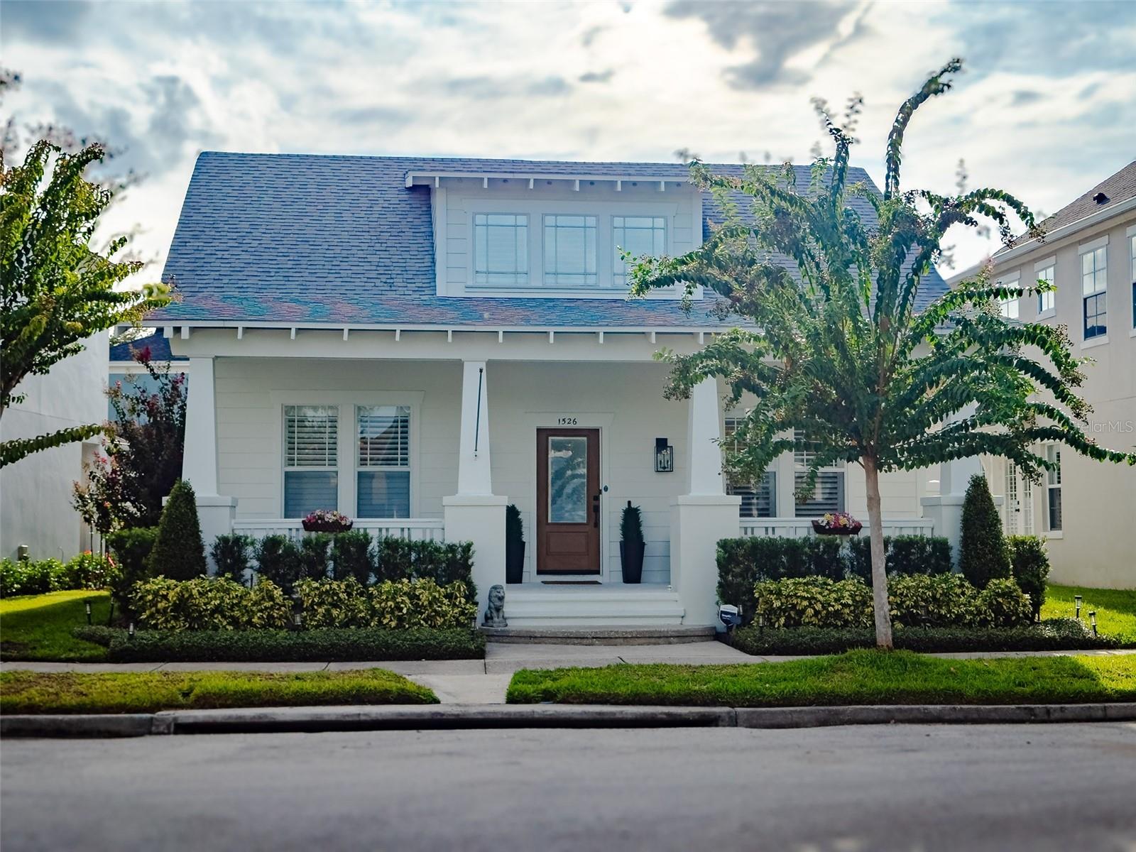Welcome to an amazing, two-story single-family Craftsman home that has incredible charm, and is located in one of the most desirable neighborhoods in Orlando, a city within a city, Baldwin Park. A gorgeous 3 Bedroom, 2.5 Bath property welcomes you home to a covered, relaxing front porch, and an updated exterior look that was completely repainted in June 2024. The layout is open and inviting and provides a primary bedroom on the main floor, and upstairs is a wonderful loft, with two additional bedrooms on each side and the second bathroom. The floors were upgraded throughout to LVP in June 2023 along with new baseboards. Closets were updated at the same time along with the installation of a fence, to bring privacy and an opportunity to create an outdoor space to call your own. Do you enjoy low energy bills? The home provides a 6.615 KW solar system with battery / photovoltaic panels that keeps the combined utility bill very favorable. The roof was replaced in July 2019 and the HVAC and Hot Water Heater will be replaced PRIOR to closing for the Buyer to enjoy BRAND NEW. Baldwin Park has so much to enjoy; from easy access to two sizeable lakes, to more than 200 acres of planned parks and open spaces. In addition to nature, residents have access to three pools, two fitness centers and three gathering spaces. Schedule a showing now and become a part of the Baldwin Park community, and enjoy an active lifestyle in a thriving area that is Neighborhood Friendly. City Smart.