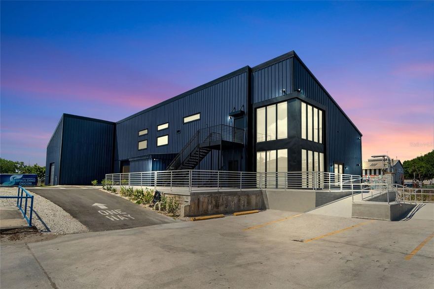 One or more photo(s) has been virtually staged. Florida Commercial Group presents 3605- 3615 E. 7th Avenue.  This property consists of a 4-building portfolio of 5 available spaces.  Ready for occupancy is an oversized warehouse and 2 office buildings, one of which features an adjoined warehouse space.  The entire property has been completely renovated from top to bottom and spans 1.19 acres offering 255’ of direct frontage and signage on east 7th Avenue.  
A rare investment potential or owner/ user opportunity, this property offers many occupancy options: a new owner may occupy both offices and warehouses, or all of the buildings may be leased out individually or as a collective, or the owner may occupy part of the property and lease out the remaining buildings.  The choice is yours. There is plenty of onsite parking and the entire property is fenced.  The IG zoning of this property provides excellent flexibility for distribution, manufacturing, mixed use, a workshop and or storage. 
Included in the purchase of this unique industrial package is Building A: 3,432 SF and currently tenant occupied by a long-standing Bakery tenant.  This tenant signed their NNN lease in 2017 for 15 years with 3% yearly increases.  
Building B offers a move-in ready, oversized, 6k SF newly renovated, high- end office with all the bells and whistles. There is plenty of natural lighting throughout and lots of office suites for staff or private workspaces.  This building features top quality, full renovations to the kitchen and offices.  There is also a gym onsite along with updated restrooms and private showers.  Affixed to this office at the rear of building B is a 1K SF warehouse that may be used in conjunction with the 6k SF office.  
Located at the back of the property and adjoining building B is a 4K SF warehouse considered building C. This building boasts +33’ ceiling heights and 2 grade level roll up doors.  A wide-open layout and is also move-in ready.
Directly across from building C is building D, a fully renovated 2K SF office building that is move-in ready and boasts 3-4 offices, a kitchen/ breakroom and plenty of onsite parking.  The current owner can vacate at the close of purchase allowing an investor to select a new tenant at market rate and terms or to allow for an owner/ user to grow their assets and operate their own facility. Florida Commercial Group can stay on as property manager for the new owner.  Both office buildings are fully furnished.  Call today for a showing and additional details.