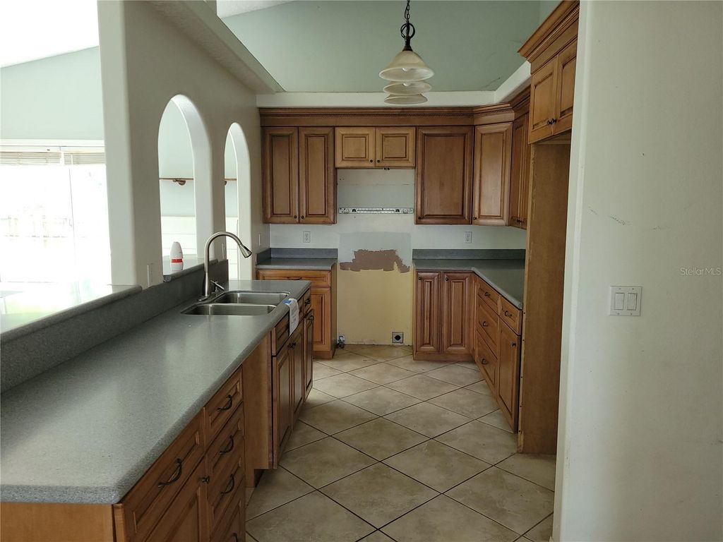 Photo of 1111 Mina Avenue NE, Palm Bay, FL 32907 (MLS # O6402741)