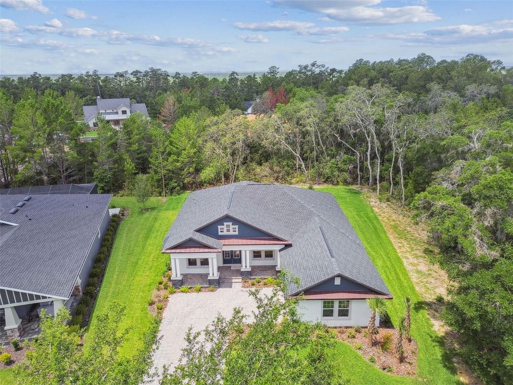Photo of 6109 Dusk Rose Lane, Brooksville, FL 34601 (MLS # W7869040)