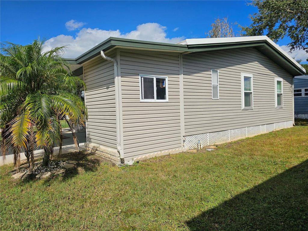Photo of 106 Dolphin Drive E, Oldsmar, FL 34677 (MLS # TB8438561)