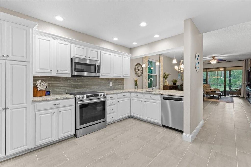 Photo of 10 Shamrock Way #10, Oldsmar, FL 34677 (MLS # TB8506563)