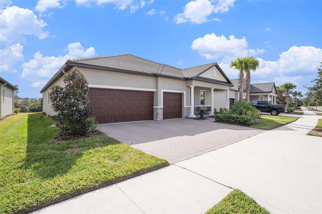 Photo of 17100 Forge Surf Street, Land O Lakes, FL 34638 (MLS # TB8462144)