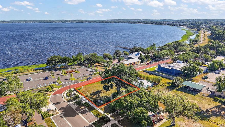 Prime downtown Clermont location for Sale, Land lease or build to suit! This corner lot boasts 100' of frontage on Osceola Street looking north over Lake Minneola, and 110' on  West Avenue, situated on two of the city's highest traffic streets during events. this site is uniquely suited for a state of the art restaurant with a rooftop entertainment area. Short walking distance to the (Now under Construction) Lumber District, a new multifamily complex (under construction), food court, and entertainment area with live music. Enjoy direct access to Lake Minneola's beachfront with boat parking and in addition to a parking lot with over 80+ parking spaces in front, and street parking as well. This property offers unparalleled visibility and foot traffic. As downtown Clermont continues to grow and develop, this site is poised to be a key player. Owner has invested in extensively in architectural drawings and renderings. Don't miss this opportunity to be part of the city's thriving entertainment community!"