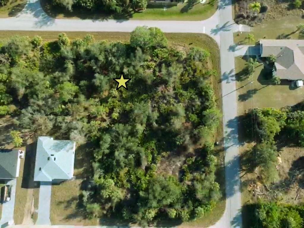 Seize the opportunity to build your dream home on this prime residential lot, ideally located in the heart of Port Charlotte. With dimensions of 80 x 125 feet, this lot offers plenty of space to bring your vision to life — whether you’re planning a custom residence or a smart investment property. Location is everything, and this property delivers. Enjoy the convenience of being just minutes from top-rated schools, popular dining spots, shopping centers, and essential services. With easy access to US 41, El Jobean Rd, and Murdock Circle, commuting and running errands are a breeze. Outdoor enthusiasts and beach lovers will appreciate being only 22 miles from the stunning beaches of Gasparilla Island — perfect for day trips or weekend escapes. For a closer adventure, Fishermen’s Village, known for its waterfront shops, restaurants, and entertainment, is just 9 miles away. Plus, the vibrant city of Punta Gorda offers even more options for dining, shopping, and recreation just a short drive from your future doorstep. This is more than just a piece of land — it’s a blank slate in a desirable, up-and-coming neighborhood with no HOA restrictions, giving you the flexibility to design and build as you wish. The seller is also offering a package deal for four adjoining lots that together cover the entire corner (see photos) The following MLS numbers — TB8356593, TB8356537, TB8356511, and TB8356510 — are the adjacent lots. Engineering plans, civil plans, and a survey are also available for purchase separately and are negotiable.