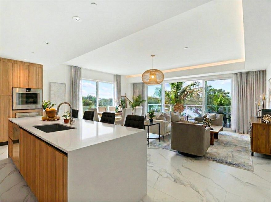 One or more photo(s) has been virtually staged. Welcome to Residence 213, a thoughtfully curated true 3-bedroom, 3-bathroom sanctuary within the award-winning, gated enclave of Serena by the Sea. Renowned for its cutting-edge, wellness-forward design and solid concrete construction, this exclusive community of just 80 residences offers the highest level of luxury in the Tampa Bay area.

Located in the highly sought-after South Tower—sharing the floor with only two other residences—this rare corner unit offers breathtaking, southwest-facing views of Stevenson’s Creek and the Clearwater Intracoastal Waterway. Oversized windows effortlessly frame the spectacular sunsets and bathe the space in natural light. Inside, you are greeted by an elegant blend of natural white oak hardwood flooring and marbled porcelain tile.

The heart of the home is a chef’s dream, featuring sleek Italian cabinetry, integrated LED lighting, and premium German-imported Gaggenau appliances, including a gas cooktop, oven, and microwave. An expansive stone waterfall-edge island serves as a stunning focal point, flowing seamlessly toward large sliding glass doors that open to a beautiful private terrace overlooking the water.

Retreat to the opulent owner’s suite, which boasts a custom Italian built-in closet system and a spa-inspired en-suite bathroom. Enjoy the modern elegance of a floating dual-sink vanity with quartz countertops, a frameless glass shower, and LED backlit anti-fog mirrors. Notably, every bedroom in this residence features its own en-suite bathroom and handcrafted Italian closets with ambient lighting.

Beyond the impeccable residence lies 23,000 square feet of five-star, resort-style amenities. Spend your days at the heated infinity-edge saltwater pool and private cabanas, or entertain at the covered grilling pavilions and firepit lounge. The private Spa Club elevates everyday living with a cedar plank sauna, massage suites, a salon/makeup studio, a saltwater jacuzzi, and a cold plunge bucket. Complete with a state-of-the-art fitness center, dog run and wash station, and full-service concierge staff, Residence 213 isn't just a home—it's a premier coastal lifestyle.