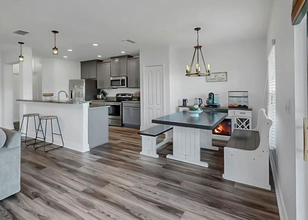 Photo of 10136 Newminster Loop, Ruskin, FL 33573 (MLS # TB8459267)