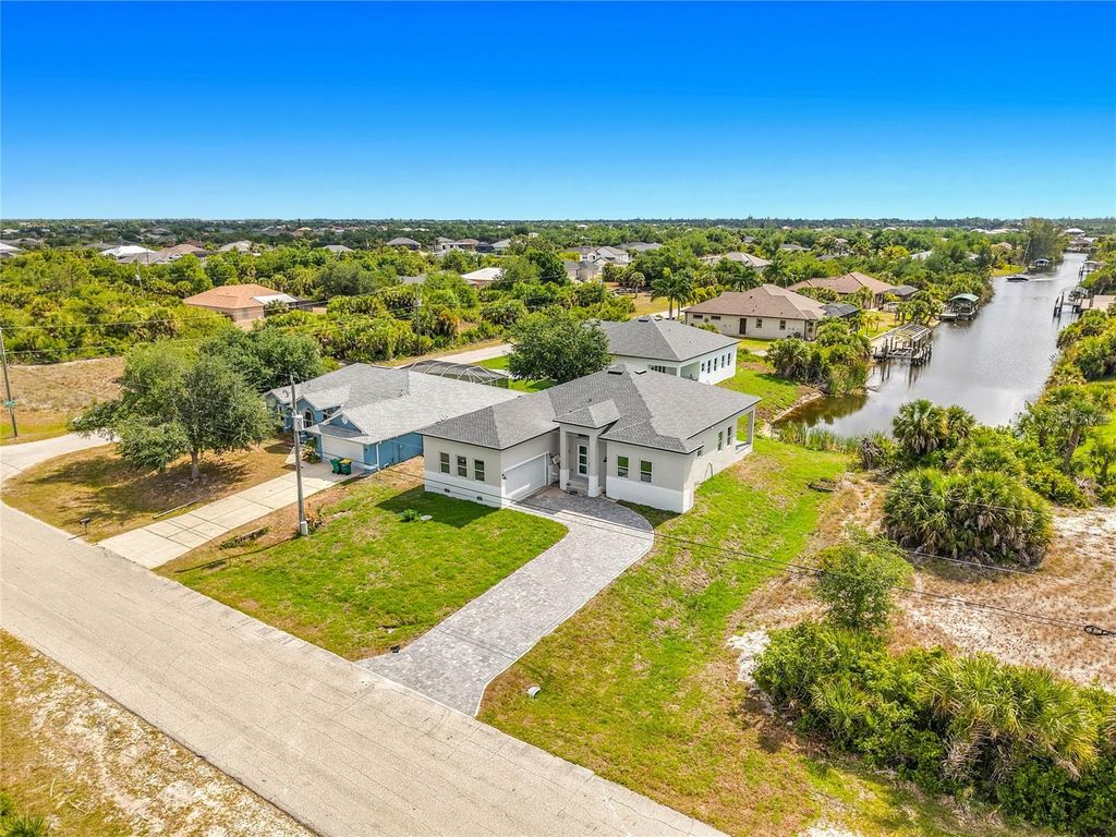 Photo of 10262 Kingsville Drive, Port Charlotte, FL 33981 (MLS # C7525493)