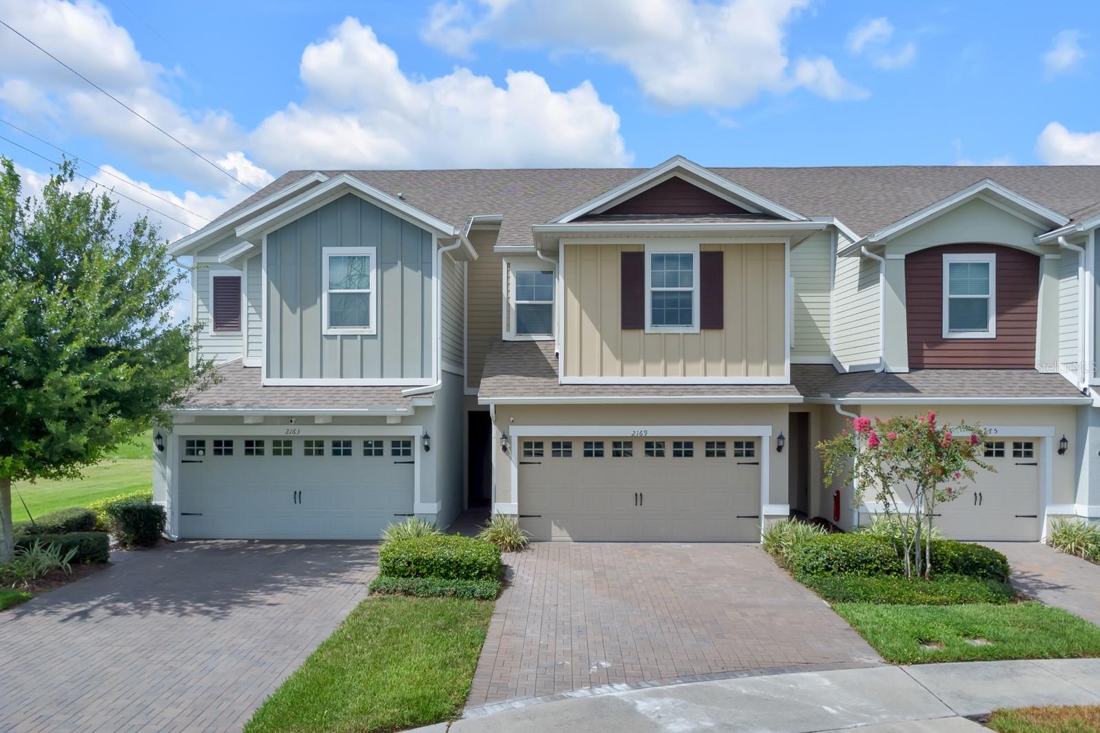 Welcome to Sawgrass Landing! This beautifully maintained 3-bedroom, 2.5-bathroom townhome with a 2-car garage offers modern comfort, a tranquil waterview, and a prime location. Built in 2019, the home features a bright open-concept layout, perfect for both relaxing and entertaining. The stylish kitchen boasts granite countertops, stainless steel appliances, and sleek cabinetry, opening into a spacious living and dining area. A convenient half bath is located on the main floor for guests. Upstairs, the primary suite offers a walk-in closet and dual vanities, along with two additional bedrooms and a full bath. Enjoy your morning coffee on the private patio overlooking the water, or take advantage of the community amenities like a pool, playground, and dog park. Located just minutes from Lake Nona, Medical City, Amazon’s fulfillment center, and the SunRail train station, with easy access to major highways, shopping, and dining, this home offers the perfect blend of comfort, convenience, and connected living.