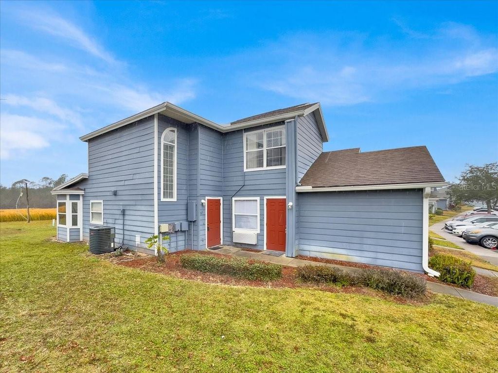 Photo of 405 Caribbean Dr #Main, Davenport, FL 33897 (MLS # O6274025)