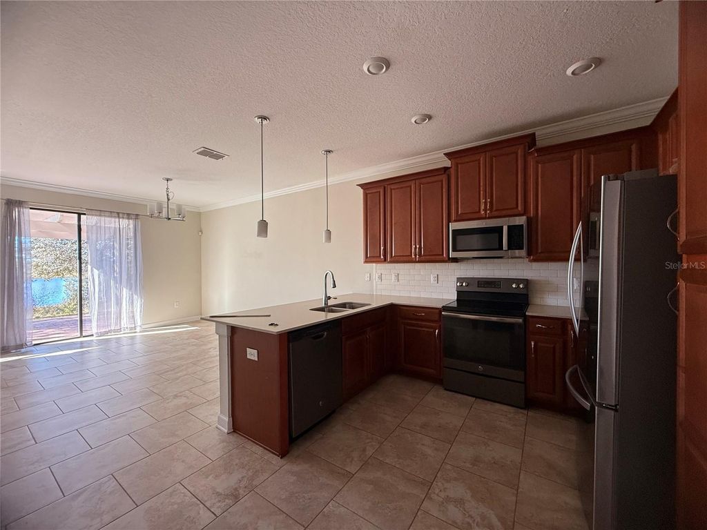 Photo of 1316 Royal St George Boulevard, Davenport, FL 33896 (MLS # S5140695)