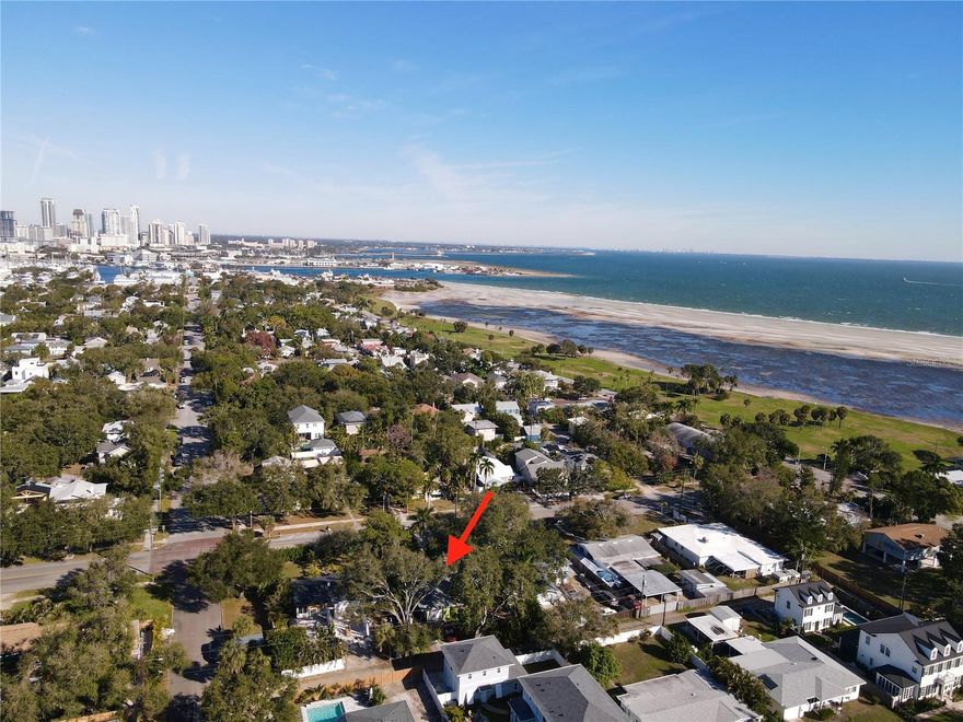 Location, Location, Location! Nestled in the heart of Historic Old Southeast, this charming home is situated in the ideal spot—never flooded and not in a flood zone (Zone X, no flood insurance required)—just steps from Lassing Park and the sparkling waters of Tampa Bay.
This well-maintained 2-bedroom, 1-bath home sits on a generously sized lot shaded by manicured oaks and mature landscaping. Inside, you’re welcomed by a bright and spacious living and dining room combination, featuring large windows and wall-to-wall sliding glass doors that fill the home with natural light. Open the sliders to the lanai and expand your living space for additional indoor-outdoor living.
The kitchen offers stainless steel appliances (range and refrigerator), plenty of cabinet and counter space, a built-in pantry, and a cozy eat-in area. The primary bedroom features direct access to the lanai and shares a hall bath with the generously sized guest bedroom.
Step outside to enjoy the covered, screened lanai or relax in the tranquil, shaded backyard—perfect for entertaining or unwinding. Additional features include alley access with an oversized one-car garage, hurricane-impact windows, shutters for the sliders, AC recently serviced in 2025, and a range replaced in 2022.
The location is unbeatable—just one block from Lassing Waterfront Park and only 1.5 miles from vibrant Downtown St. Petersburg, home to world-class museums, the St. Pete Pier, local dining and bars, festivals, sporting events, and nightlife. With easy interstate access, you’re just 15 minutes from the white sands and emerald waters of St. Pete Beach.
Don’t miss this rare opportunity to own a charming Old Southeast gem. Schedule your private showing today!