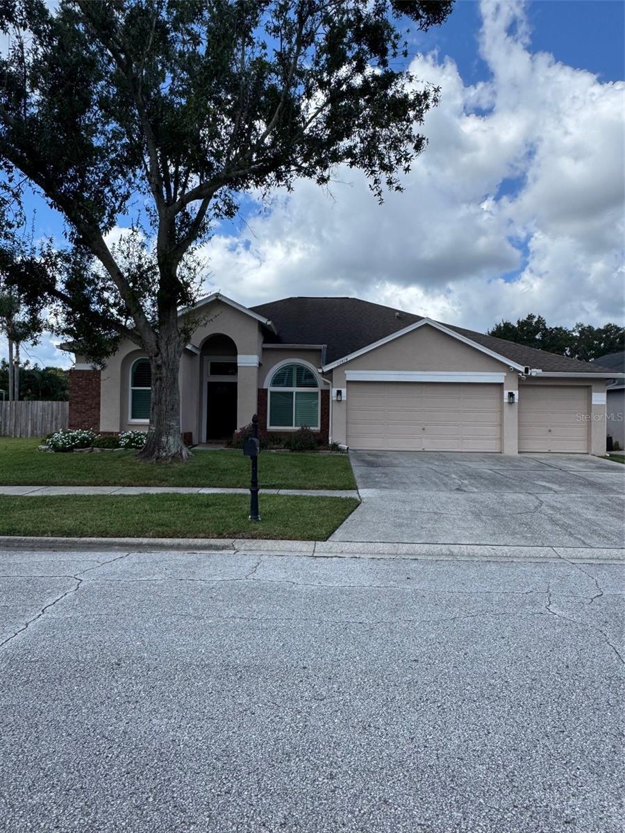 Welcome to your dream pool home in the sought-after Ventana neighborhood in Carrollwood! This exquisite 4-bedroom, 3-bathroom residence spans 2,217 square feet and features a spacious 3-car garage. Upon entering, you'll be greeted by a bright open floor plan, showcasing a welcoming living room, dining area, and a family room. The kitchen is a chef’s delight, featuring solid wood cabinets, quartz countertops, stainless steel appliances, and a whole house water softener. Recent upgrades include a new refrigerator (2025), New flooring (2025), new showers in master and jack and Jill bath (2025), new water heater (2025), new hurricane proof PGT Windows (2025), new solar panels to heat the pool (2025), new window shutters (2025), EV charger for Electric vehicles (2025).The primary bedroom offers a luxurious en suite bathroom with wood cabinets, granite countertops, a relaxing garden tub, and dual sink vanities. Enjoy seamless access to the screened-in porch with concrete pool, perfect for outdoor relaxation. The split floor plan offers privacy, with the fourth bedroom situated off the family room that can be closed off, paired with a separate private bathroom and backyard access—ideal for an in-law suite or entertaining guests! Outside, the private fenced backyard is perfect for entertaining or quiet evenings. Conveniently located less than 15 minutes from Tampa Airport and under 10 minutes from Citrus Park Town Center, with shopping and dining close by, and Carrollwood Village Park. Not zoned but Deer Park Elementary School, Carrollwood Day School and Sickles High School nearby.