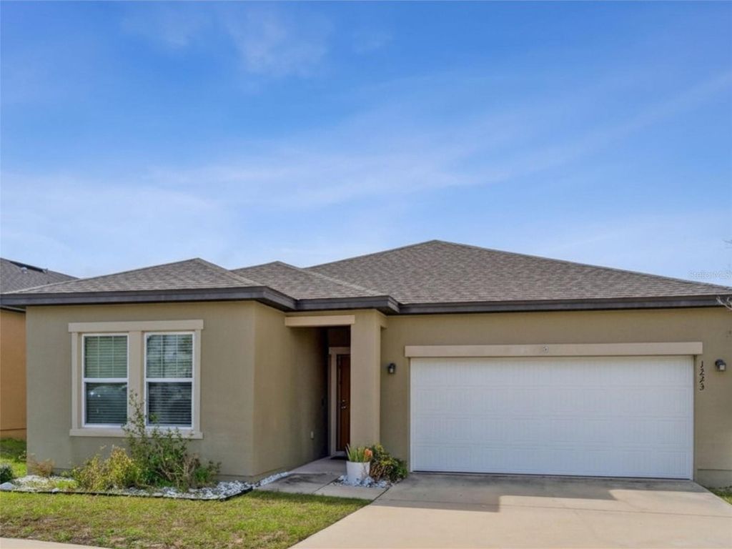 Photo of 1223 Lycaste Drive, Davenport, FL 33837 (MLS # OM725542)