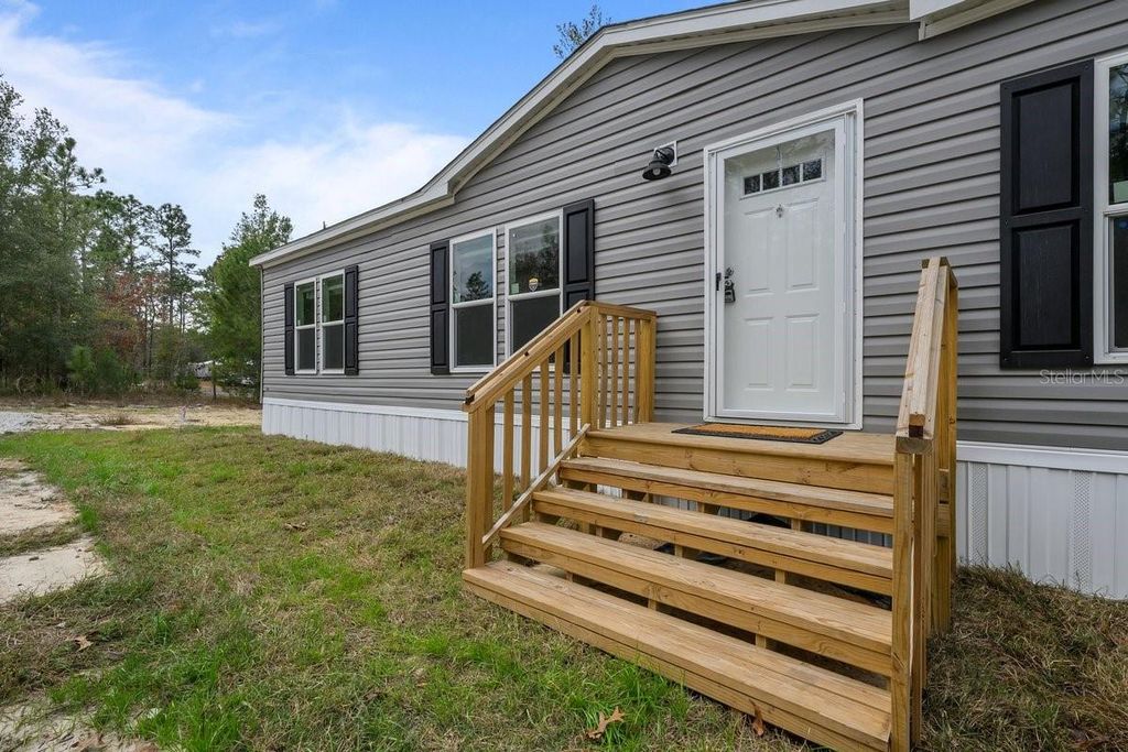 Photo of 194 Whirlwind Loop, Hawthorne, FL 32640 (MLS # GC536275)