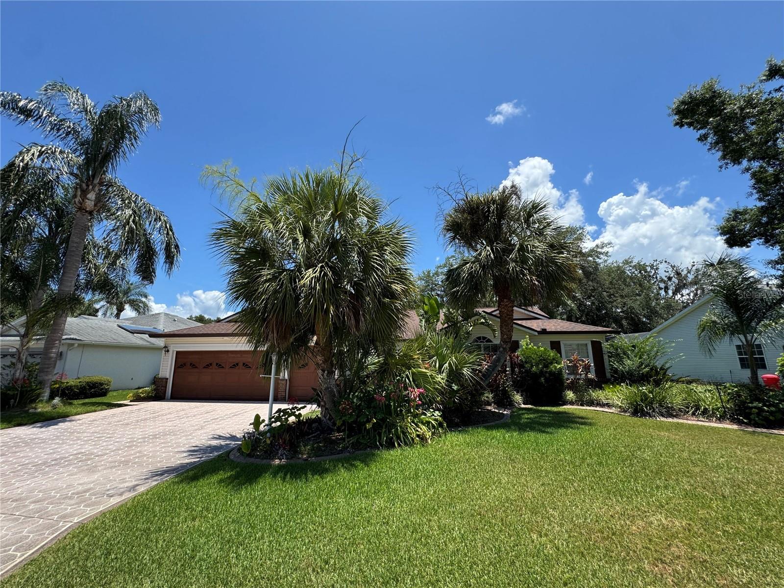 Welcome to this charming home nestled in a vibrant 55+ golf course community loaded with exceptional amenities. Enjoy access to 3 sparkling swimming pools, 3 clubhouses, 2 scenic golf courses, his-and-hers saunas, 2 fitness centers, a billiards room, softball, tennis, pickleball, and over 100 active clubs. The community is golf cart friendly and even features its own restaurant and lounge, perfect for socializing and relaxing close to home. Inside, you'll find brand new carpet, a modernized kitchen with new laminate flooring (2021), a new high tech high efficiency heat pump water heater, a new A/C system (2020), and a roof installed in November 2016. Also, for those golf cart lovers next to your large 2 car garage is a separate garage specifically for your golf cart or motorcycle. This home is move-in ready and offers incredible value for the neighborhood. With so much to offer at such a great price, this is an opportunity you won’t want to miss in one of the area’s most desirable active adult communities. All room measurements are approximate and must be confirmed by the buyer or buyer agent.