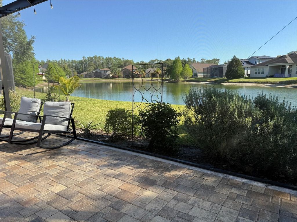 Photo of 4810 Diamonds Palm Loop, Wesley Chapel, FL 33543 (MLS # TB8371854)