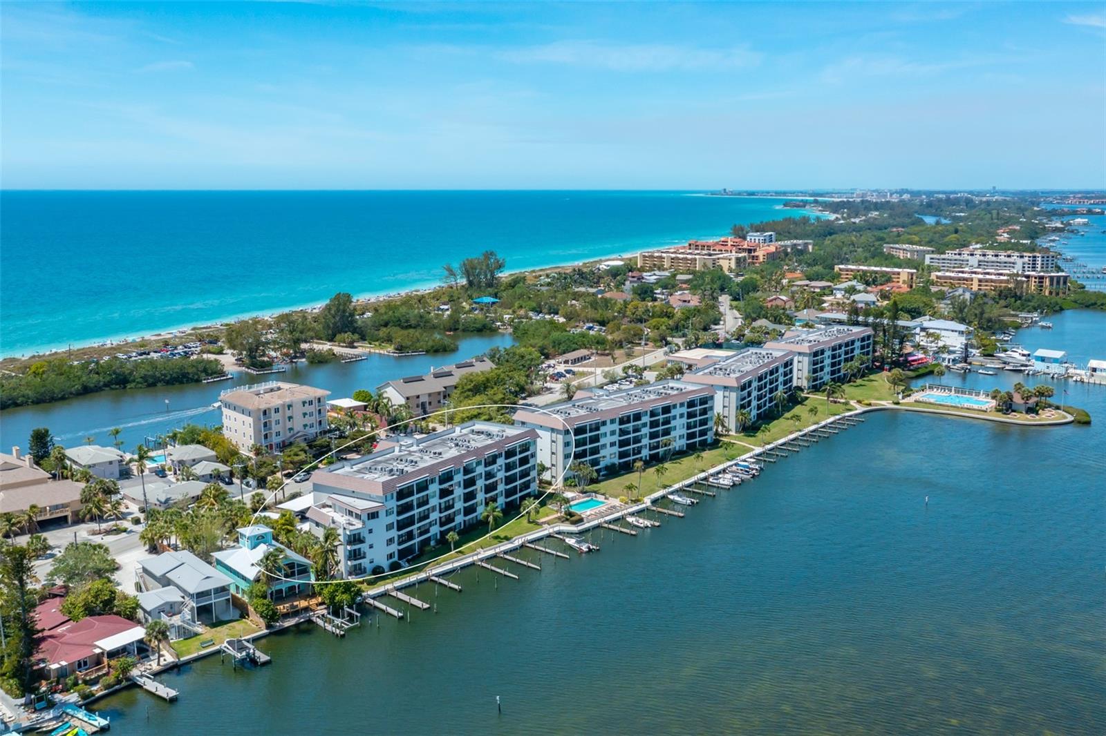 If you love water views, this is your place! Imagine enjoying the sunrise over Little Sarasota Bay every morning from your lanai and the sunset at Turtle Beach. Sunrise Cove you can have the best of both worlds! It offers so many amenities from boating, kayaking, lighted pickle ball and tennis courts with rubberized surface, large clubhouse with kitchen and billiards and fitness rooms, picnic tables at the water’s edge and a lending library! This condo is located on the South end of Siesta Key in the bayside community of Sunrise Cove. It has one bedroom, one bathroom with a custom-built queen Murphy Bed for extra comfortable sleeping space. This condo is located directly on the Intracoastal Waterway with gorgeous views from your lanai, living area and bedroom. An updated kitchen with beautiful tile in the kitchen and entryway and beautiful stainless-steel appliances. This fully furnished condo is ready to move in to with maintenance-free living. Plantation shutters in the bedroom and impact windows in the bedroom and kitchen. Enjoy lounging at the beach or swimming in one of the two bayside heated pools. There are also boat docks available for a very low yearly fee, as well as discounts on rentals at the Bayfront Marina next door. Wi-Fi is available to all rental units and common laundry areas are on each floor. The recent updates were done in 2015. Sunrise Cove is a very social community with an active social calendar. It is located right next door to Turtles Restaurant and only .2 miles from the fabulous Ophelia's Restaurant. Free Trolley stop is just across the street from the complex, with free rides to shopping, restaurants, the public beach of Siesta Key and Siesta Key Village! The complex allows 1-month rentals and has on-site management for your rental options. Current list price is below recent property appraisal dated 10/27/2023.