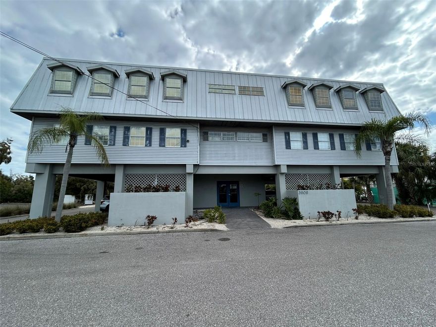 Rare office space available in well established commercial building in the heart of Holmes Beach on Anna Maria Island. The office area resides in a commercial condominium equipped with elevator, a public restroom for men and women on the second and third floors.  Sign space available and one parking spot under the building.  Plenty of exterior parking with both a street and back door entrance. Building provides diverse occupants of financial planning, medical offices, and construction. Current layout of the 988 square feet is a break room with galley kitchen with updated kitchen cabinets.  Furthermore, there are three (3) areas equipped with desk counters accommodating several office spaces as well as one room that contains shelving for miscellaneous storage. Interior is decorated coastal with ship lap walls and large doors with glass. Perfect for a small-medium professional office. Space is directly off the main commercial thoroughfare running North and South on Anna Maria Island. This is the hub of Anna Maria Island with Publix, CVS, Walgreens as well as the largest shopping area on Anna Maria Island all an orange throw across the street.  This is a perfect location to service residents and visitors of Anna Maria Island. Owner financing will be considered, act now!