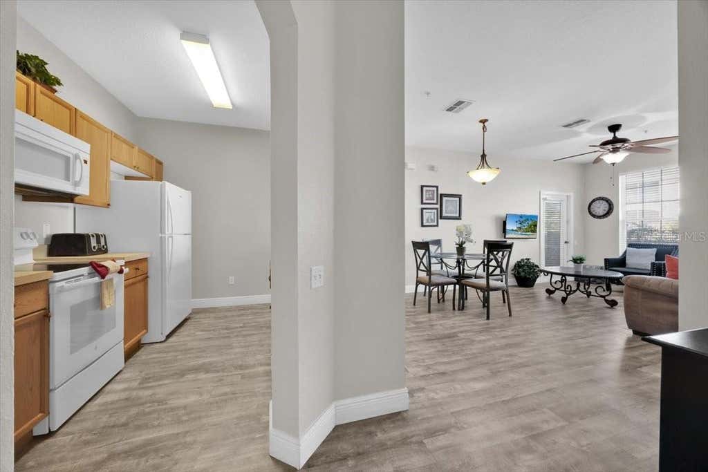Photo of 8107 Coconut Palm Way #102, Kissimmee, FL 34747 (MLS # O6420801)