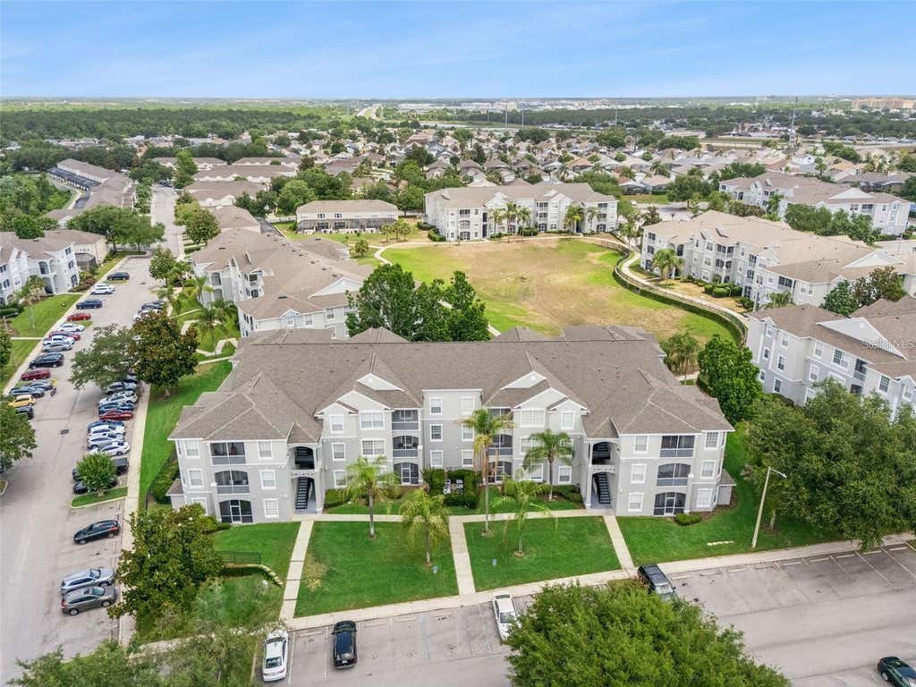 Photo of 8107 Coconut Palm Way #102, Kissimmee, FL 34747 (MLS # O6420801)