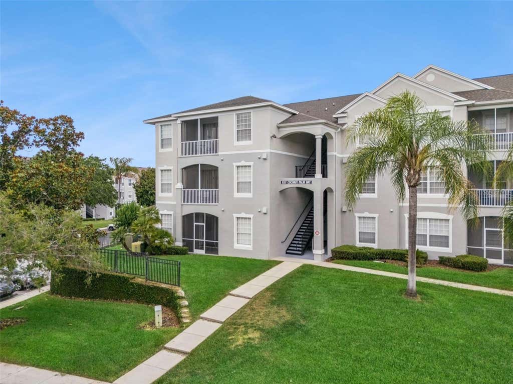 Photo of 8107 Coconut Palm Way #102, Kissimmee, FL 34747 (MLS # O6420801)