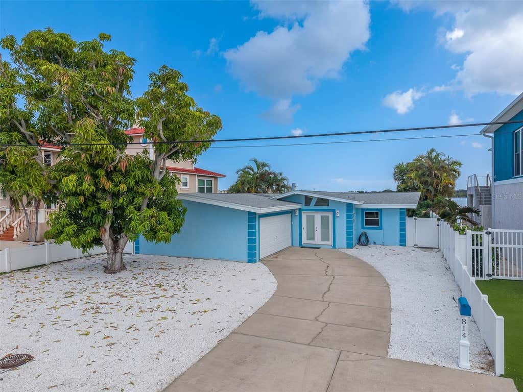 Photo of 814 Bay Point Drive, Madeira Beach, FL 33708 (MLS # TB8539142)