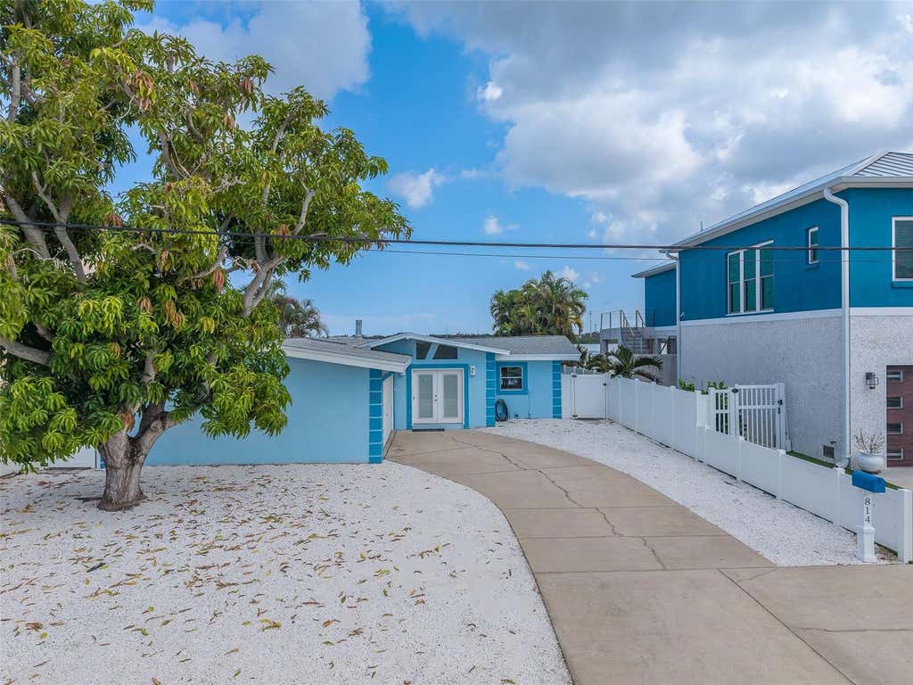 Photo of 814 Bay Point Drive, Madeira Beach, FL 33708 (MLS # TB8539142)
