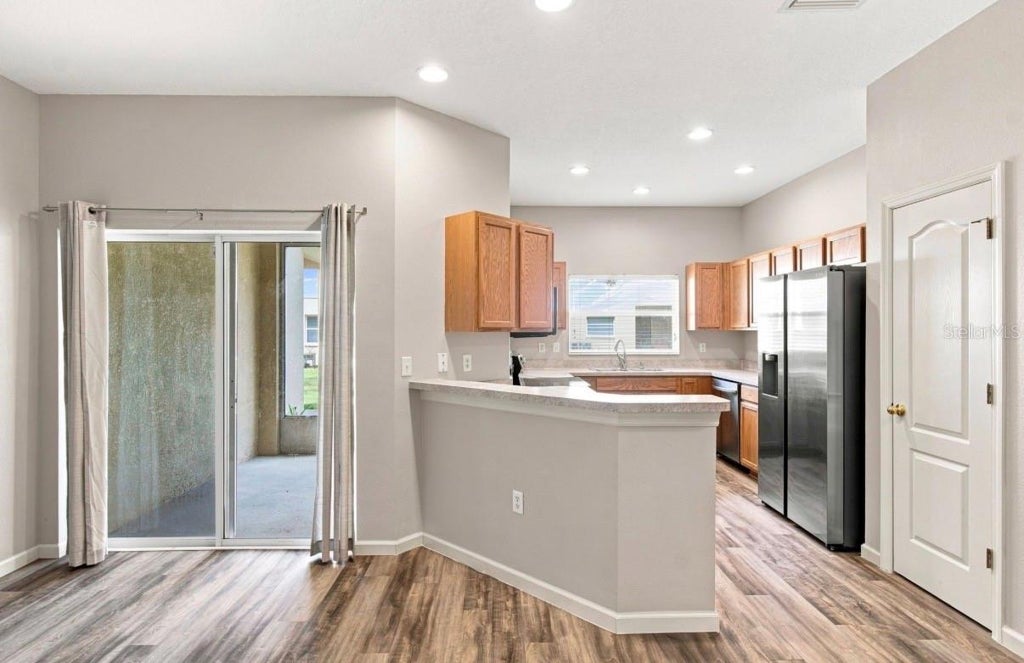 Photo of 9904 Venetian River Way, Tampa, FL 33619 (MLS # TB8545815)