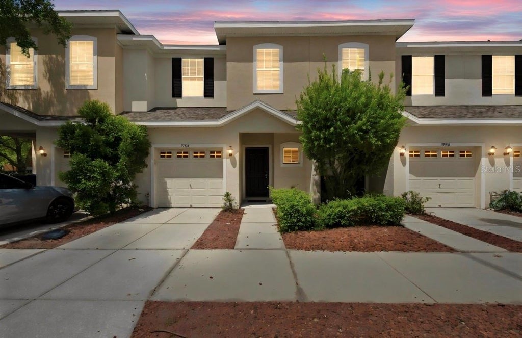 Photo of 9904 Venetian River Way, Tampa, FL 33619 (MLS # TB8545815)