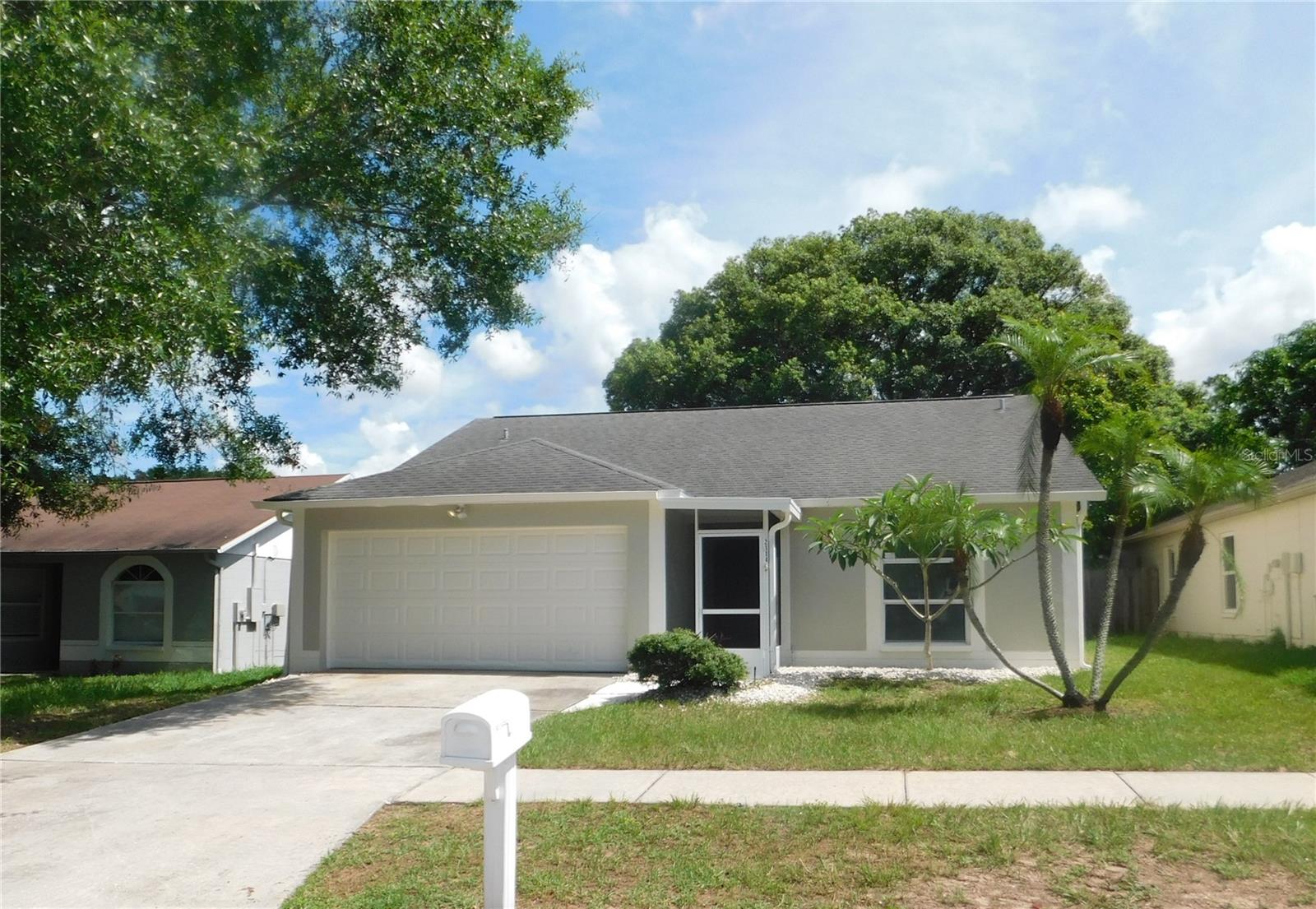 Welcome to this beautifully updated 3-bedroom, 2-bath home ideally located in central Valrico. Enjoy the freedom of no HOA or CDD fees! Freshly painted inside and out, this home features an inviting open floor plan with a spacious dining area and a large living room with brand-new laminate flooring. The kitchen boasts granite countertops, a breakfast bar overlooking the living area, and plenty of cabinet space. The split-bedroom layout ensures privacy, with the primary suite offering a relaxing soaking tub, new granite dual-sink vanity, and luxury vinyl plank flooring. Two additional bedrooms are tucked on the opposite side of the home and share a nicely updated hall bath with matching LVP flooring. Step outside to a fully fenced backyard with a generous covered and screened lanai—perfect for relaxing or entertaining. A large storage shed and roomy 2-car garage complete the package. Conveniently located near schools, shopping, dining, and major highways for an easy commute. Don’t miss this fantastic opportunity—schedule your tour today!