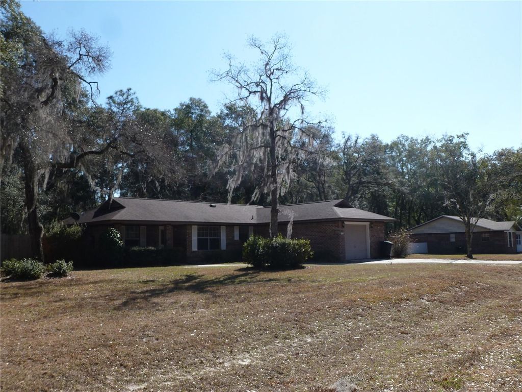 Photo of 5935 SE 230th Terrace, Hawthorne, FL 32640 (MLS # GC536894)