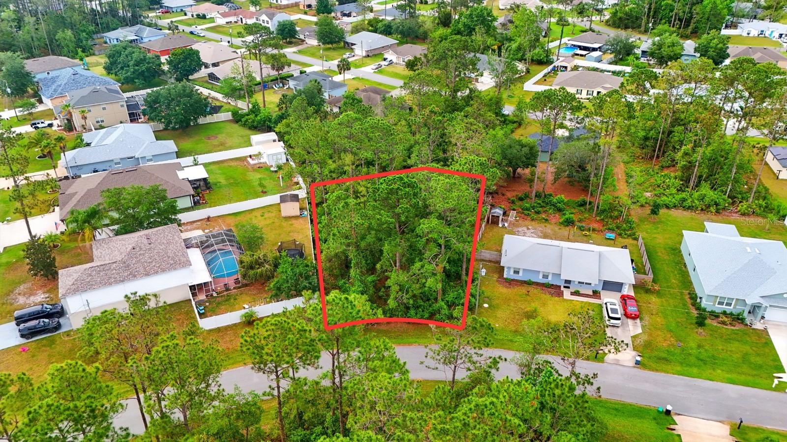 Welcome to the gorgeous city of Palm Coast! Build your dream home here on this lot located in a well-established neighborhood of beautiful homes in the heart of Palm Coast and central to many conveniences. This property is slightly oversized. Palm Coast is situated on 70 miles of saltwater and freshwater canals and the Intracoastal Waterway and less than 10 miles from beautiful Flagler Beach! The City offers a dozen beautiful parks, 130+ miles of connecting trails and paths for walking/bicycling, abundant fishing and boating, and world-class tennis and golf. Grocery shopping, dining, I-95 and more all close by. Very convenient to nearby Ralph Carter Park. No timeline to build.. build when you are ready! Only a 30 mile drive to St. Augustine to the north or Daytona Beach to the south, so you have easy access to lots to do in various surrounding cities and counties. Come take a look… see why Palm Coast is a Florida Paradise that so many love to call home!