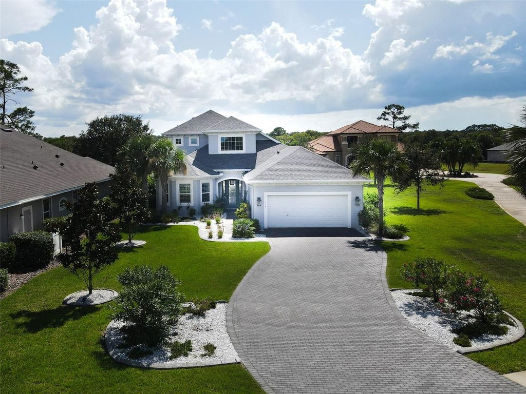 Photo of 114 Heron Drive, Palm Coast, FL 32137 (MLS # FC312949)