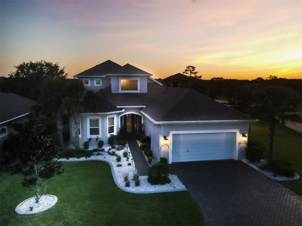 Photo of 114 Heron Drive, Palm Coast, FL 32137 (MLS # FC312949)