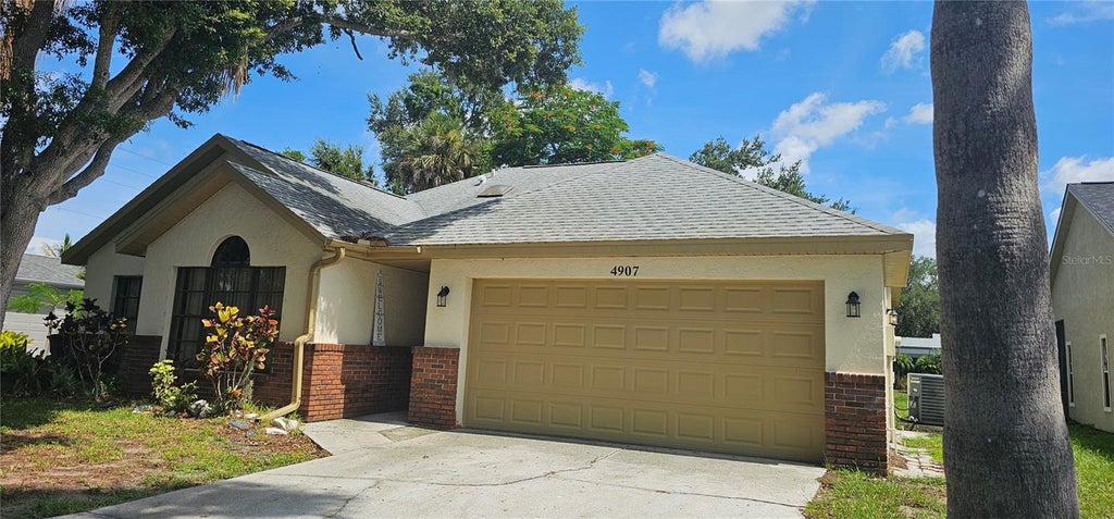 Photo of 4907 82nd Place E, Sarasota, FL 34243 (MLS # A4699515)