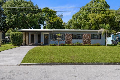 Photo of 1408 Watts Avenue, Orlando, FL 32809 (MLS # O6418488)