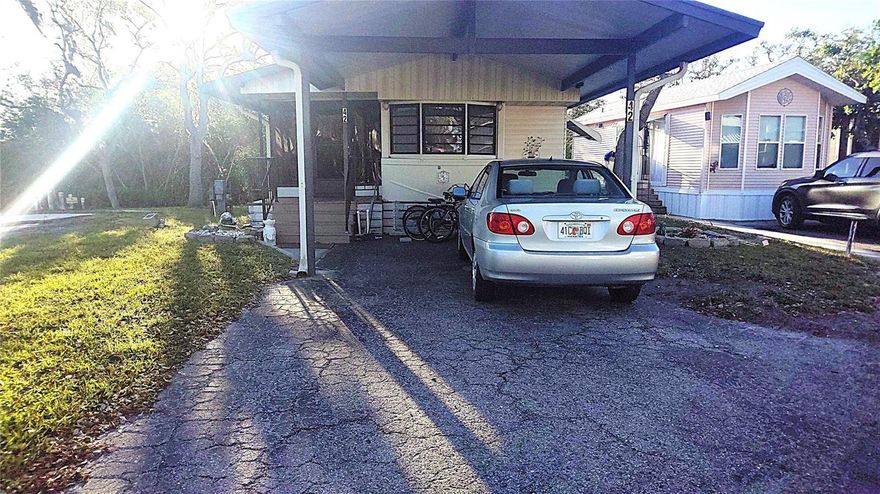 Waterfront property along Sugar Creek! This home features a large and updated addition providing more living space with so much sun light! This home features all new plumbing, a new HVAC system, new duct work and new hot water tank. Come put your own touches on this home to make it your perfect Florida home. This 55+ community has a large heated pool, miniature golf, pickleball, shuffleboard and many wintertime activities and classes to keep you busy. This home is on a pet lot.