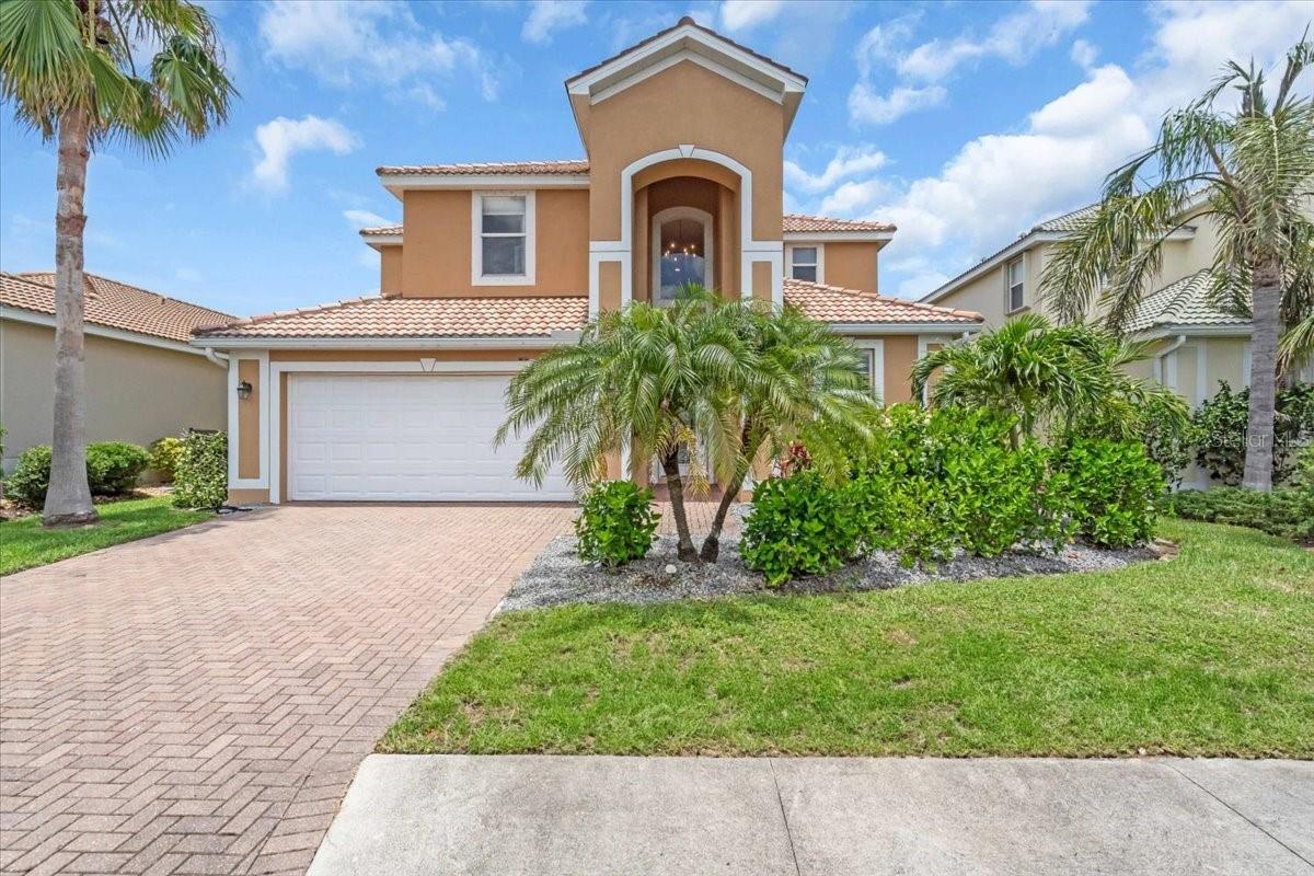 One of the Newest REMODELED MONTE CARLO Models Just Hit the Market in Stoneybrook of Venice!
This stunning 2-story home offers the perfect blend of spacious living, privacy, and luxury—ideal as a primary residence or second home. Situated in the highly desirable gated community of Stoneybrook at Venice, this home features 5 bedrooms + bonus room, 3 full bathrooms, 2 family rooms, and a 3-car garage with space for a workshop, extra storage, or even boat parking.
Step outside to your private backyard oasis, featuring a heated Pebble Tec pool and spa, surrounded by pavers and enhanced with a brand-new pool cage (2024). The lanai overlooks a peaceful community lake, creating the perfect setting for relaxation or entertaining.
Inside, enjoy extensive designer upgrades throughout, including:
A brand-new, fully remodeled kitchen showcasing quartz stone countertops, VIKING stainless steel appliances, a separate dry bar, custom cabinetry, and a stunning oversized quartz island with a porcelain farmhouse sink
Designer gold fixtures and chandelier pendant lighting that add elegance and style
New luxury vinyl flooring throughout the home
Custom designer lighting fixtures added throughout
Fully remodeled primary bathroom with bright, custom tile work, a walk-in shower, soaking tub, and a his-and-hers full-wall quartz vanity
New vanities added in all bathrooms
Fresh landscaping enhancing curb appeal
The first floor includes a full guest suite with separate bedroom and bathroom—ideal for multi-generational living or visiting guests. The open-concept living area flows effortlessly from the gourmet kitchen, which also includes a built-in desk area and crown molding throughout the main living spaces.
Upstairs, the expansive primary suite features dual walk-in closets, a dual-sink vanity, soaking tub, walk-in shower, and private water closet. You'll also find a loft-style office or flex space, an additional family/bonus room, three more bedrooms, and the third full bathroom.
Additional Features:
Separate laundry room
Hurricane shutters
Dual-zone HVAC system for energy efficiency
Ample indoor and garage storage space
Stoneybrook at Venice is a resort-style gated community offering premier amenities, including a 24-hour fitness center, resort-style pool, tennis & pickleball courts, basketball, playground, and a clubhouse with scheduled events and activities.
Located just minutes from I-75, US-41, Wellen Park, Myakka River, downtown Venice, and some of the Gulf Coast’s most desirable beaches: Venice Beach, Nokomis Beach, Manasota Key, Siesta Key, and more.
This upgraded, move-in-ready home is truly a rare find—schedule your private showing today before it's gone!
