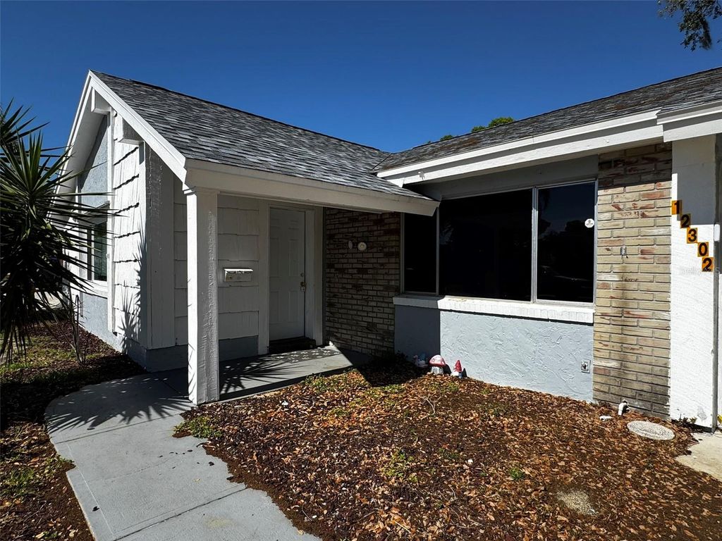 Photo of 12302 Cobble Stone Drive, Hudson, FL 34667 (MLS # TB8495397)