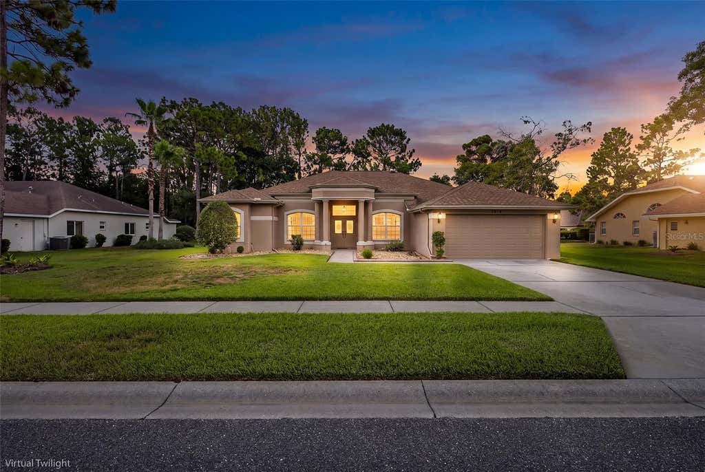 Photo of 5436 Championship Cup Lane, Spring Hill, FL 34609 (MLS # TB8523090)