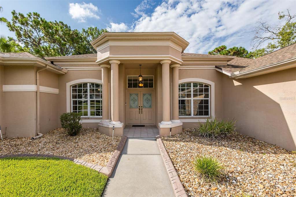 Photo of 5436 Championship Cup Lane, Spring Hill, FL 34609 (MLS # TB8523090)