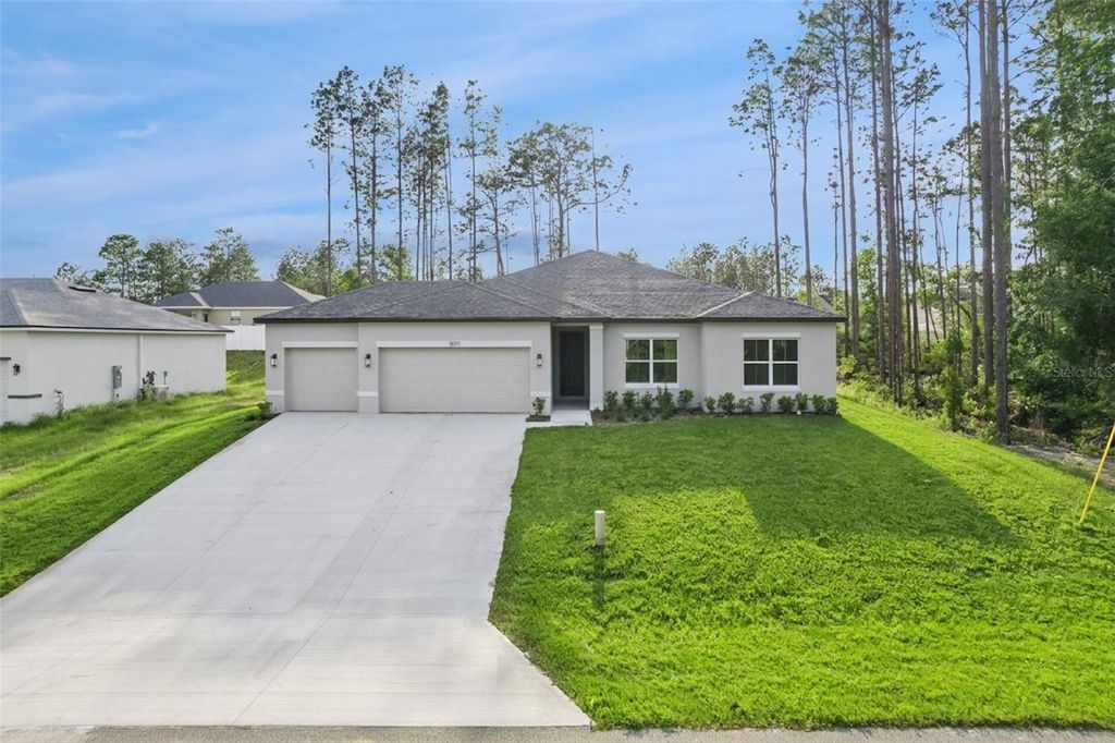 Photo of 7077 SW 131st Loop, Ocala, FL 34473 (MLS # O6402508)