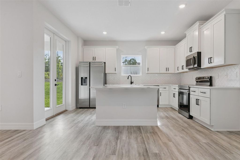 Photo of 7077 SW 131st Loop, Ocala, FL 34473 (MLS # O6402508)